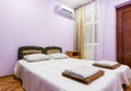 Interior of a small room with a double bed, a window and splitsistema Royalty Free Stock Photo