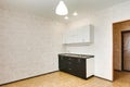 Interior in a small studio apartment. kitchen set. repair in a new building Royalty Free Stock Photo