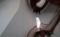 Interior Spiral Staircase and arched window inside Piedras Blancas Lighthouse on the Central California Coast Royalty Free Stock Photo