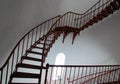 Interior Spiral Staircase and arched window inside Piedras Blancas Lighthouse on the Central California Coast Royalty Free Stock Photo