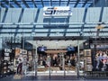 Interior sport shop with shelves of sneakers in the shopping mall in Riga, Latvia