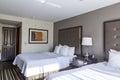 Interior of a spotless clean tidy hotel room in pastel colors