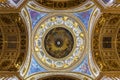 The interior of St. Isaac`s Cathedral, the dome with frescoes and gilded stucco. Saint Petersburg