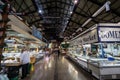 Interior of St Lawrence market with fish market stalls in the early morning.