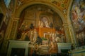 Interior of St. Peter`s Cathedral in the Vatican. Columns, paintings,