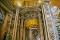 Interior of St. Peter`s Cathedral in the Vatican. Columns, paintings,