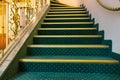 Interior stairs with green carpet - Majestic interior marble sta
