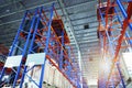 Interior of Storage Warehouse. Racks Pallets Shelves. Metal Construction. Row of Tall Shelf in Distribution Storehouse