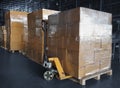 Interior of storage warehouse. stack of card board boxes with hand pallet truck. shipping distribution warehouse. cargo shipment. Royalty Free Stock Photo