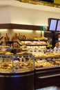 The interior of the store with a large selection of bread, rolls