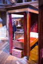 Interior of student`s bedroom. Harry Potter`s bed. Decoration Warner Brothers Studio. UK