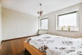 The interior of a stunning bedroom with a wooden bed