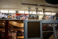 Interior of a subway train with multiple banners Royalty Free Stock Photo
