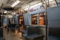 Interior of a subway train with multiple banners Royalty Free Stock Photo