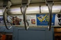 Interior of a subway train with multiple banners Royalty Free Stock Photo