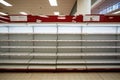 Interior of a supermarket with shelves and shelves for food products, Food shortage in a generic supermarket, with empty shelves, Royalty Free Stock Photo