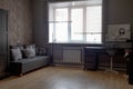 The interior of a teenage boy's room in dark gray and black colors Royalty Free Stock Photo