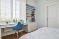 Interior of a teenage girl room in blue and white colors Royalty Free Stock Photo