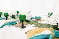 Interior of tent for wedding diner, ready for guests. Served round banquet table outdoor in marquee decorated hydrangea Royalty Free Stock Photo