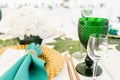 Interior of tent for wedding diner, ready for guests. Served round banquet table outdoor in marquee decorated hydrangea Royalty Free Stock Photo