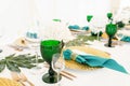 Interior of tent for wedding diner, ready for guests. Served round banquet table outdoor in marquee decorated hydrangea Royalty Free Stock Photo