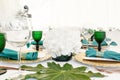 Interior of tent for wedding diner, ready for guests. Served round banquet table outdoor in marquee decorated hydrangea Royalty Free Stock Photo