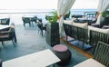 The interior of the terrace without people on the background of the sea. Recreation area near sea. Seaview restaurant