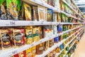 Interior of a trading floor with shelves of coffee in a supermarket.