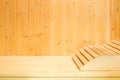 Interior of traditional classic wooden finnish sauna with headrest. Rest and relaxation in the spa to keep warm in the Royalty Free Stock Photo