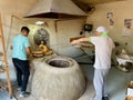 Interior of traditional Georgian bakery with circular clay oven, Kutaisi, Georgia, 5.08.2022. Royalty Free Stock Photo