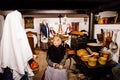 Interior of a traditional regional village house, women make twisted cake Vanocka, Christmas in Skanzen, Polabi open-air Royalty Free Stock Photo