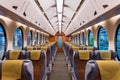 Interior of a train with empty seats. Modern train seats Royalty Free Stock Photo
