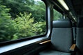 Interior Train Seat with Scenic Green View from Window Royalty Free Stock Photo