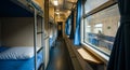 Interior of a Train Compartment with Bunk Beds and a Passenger sleeping car Royalty Free Stock Photo