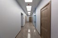 Interior of typical office - empty corridor - without furniture after construction,overhaul, remodeling, rebuilding