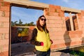 Interior of a Unfinished Red Brick House Walls under Construction without Roofing Royalty Free Stock Photo