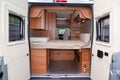 Interior of vanlife campervan coach with luxury equipment Royalty Free Stock Photo