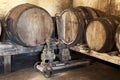 Barrels in very old wine cellar