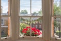 Interior of a Victorian British house with old wooden white windows Royalty Free Stock Photo