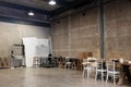 Interior view of abandoned backstage dressing room with brick wall