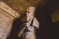 Interior View with an Ancient Egyptian Statues of Ramesses linked to the god Osiris in the Great Temple at Abu Simbel Royalty Free Stock Photo