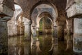Interior view of the Arab cistern Caceres Spain, reflections of the arches in the water Royalty Free Stock Photo