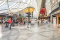 interior view of atrium and escalator hall with fascinate curvature corridor of Myzeil, designed shopping mall