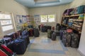 Interior view of bags in hotel`s temporary luggage storage.