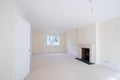 Interior View Of Beautiful Lounge Living Room With Fireplace And Wood Burning Stove In New Family House Royalty Free Stock Photo