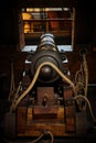 Interior view of Cannons At The Deck and Cannon Balls plus windows on old galleon with ropes Royalty Free Stock Photo