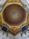 Interior view of the decorated ceiling in the Alcazar palace in Seville, Spain Royalty Free Stock Photo