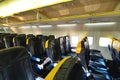 Interior view of deserted seats in low cost commercial airplane