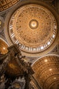 St Peter`s dome by Michelangelo Buonarroti with Bernini`s baldacchino, Vatican city Royalty Free Stock Photo