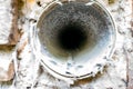 Interior view of dryer vent line with lint and dust buildup